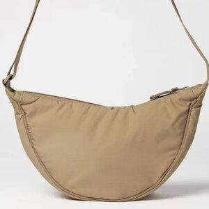 Uniqlo Round Shoulder Bag in Beige